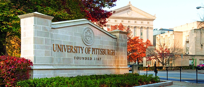 stone entrance sign to University of Pittsburgh 